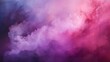 © wiwid - This close-up photo of a pink and purple smoke cloud captures its wispy tendrils and dreamy atmosphere. The smoke cloud appears to be floating in mid-air, and its soft,