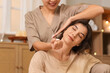 © Pixel-Shot - Young woman getting Thai massage in spa salon, closeup