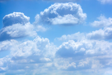 Wall Mural - White clouds against blue sky. Day.