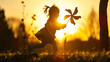© Generative AI - kid run pinwheel little baby girl silhouette play with windmill toy wind in the park happy family kid dream concept baby girl play toy pinwheel glare of the sun at sunset in the park f : Generative AI
