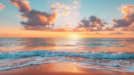 Wall Mural - Beach sunset with tranquil sea and orange clouds