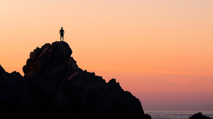 Wall Mural - Silhouette of a man on some rocks on the coast of the Costa Brava in the province of Gerona in Spain during sunset : Generative AI