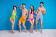 © deagreez - Photo of positive best friends ladies guys dance enjoy relax on exotic island isolated blue color background