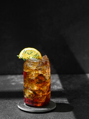 Wall Mural - cocktail with cola decorated with lemon