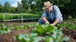 © G.Go - A farmer examining the soil quality in an organic vegetable field