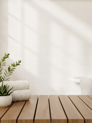 Canvas Print - a wooden table features towels and a potted plant against the white wall in a minimalist bathroom.