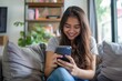© AIGen - Happy Person Cell Phone. Teenage Hispanic Girl Playing Games on Smartphone at Home