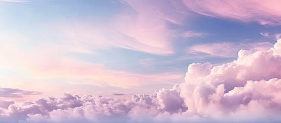 Wall Mural - soft sky with clouds in hues of pink violet and blue creates a serene and colorful atmosphere for a 