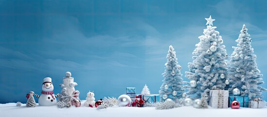 Wall Mural - a copy space image featuring a collection of christmas toys and gifts neatly placed beneath a tree w