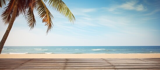 Aufkleber - Summer beach scene with a palm tree and a wooden platform providing an inviting copy space image
