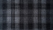 © Hamza - Dark fabric with a white grid pattern, intricate textures, modern and uneven dark black tartan woven carpet texture