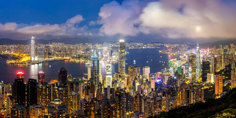 Wall Mural - Hong Kong skyline cityscape with skyscrapers panorama in downtown at night in Hong Kong, China