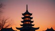 A silhouette of a traditional Japanese pagoda against an orange sky with a full moon