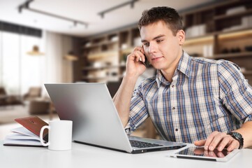 Canvas Print - adult male worker work on computer