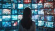 © chutikan - Woman surrounded by multiple TV screens