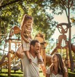 © alphaspirit - Realistic depiction of a joyful family bonding outdoors