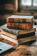 Wall Mural - A stack of books on a wooden table, perfect for educational or reading concepts