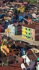 Canvas Print - Aerial drone view of the colourful houses of Burano Island, Italy. Vertical