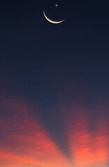 Wall Mural - crescent moon on dusk sky after sundown on twilight, religious of islamic and space for text eid al 