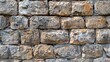 © LukaszDesign - Ancient stone wall of an 18th century castle or fortress with weathered and cracked bricks in close up view
