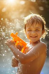 Sticker - Happy child playing with water gun on hot summer day. Cheerful child having fun with water toys. Leisure for young children in summer.