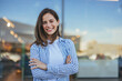 © Dragana Gordic - Portrait of a confident young woman standing at the park. Beautiful female in casuals looking at camera. Attractive woman wearing shirt and laughing