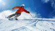 © OMD - A skier in an orange jacket and black pants skillfully descends a snow-covered slope under a bright blue sky, creating a dynamic spray of snow behind them.