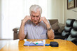© ADDICTIVE STOCK - Elderly man feeling symptoms of hypoglycemia at home