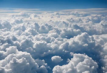Wall Mural - 'fluffy bed above blue taken sky airplane cloud'
