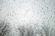 © pavelalexeev - View on winter trees and sky through wet windshield with rain drops.