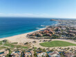 © Unwind - Aerial view of luxury golf course on the pacific ocean in Los Cabos, Cabo San Jose, Mexico