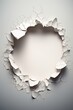 © Media Srock - A torn hole with ragged edges on a piece of paper copy space