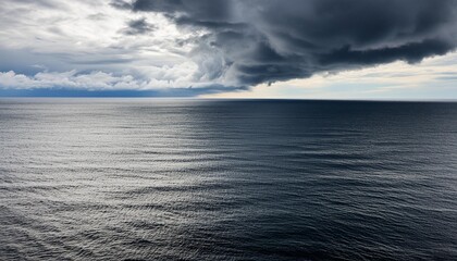 Wall Mural - dark sea surface with a dramatic cloudy sky above approaching storm generative ai