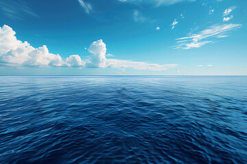 Canvas Print - Endless view of the deep blue ocean meeting the clear sky with scattered clouds. Seascape photography for travel and nature concepts. Design for poster and wallpaper