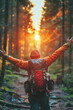 © Miljan Živković - Unknown adult man hiker walk in the forest in sunset