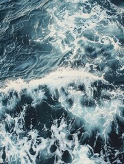 Poster - The image is of a large wave crashing into the ocean