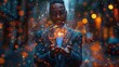 © Maxim Borbut - An image of a businessman holding a global network connection. A concept of business analytics and big data analysis