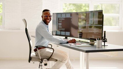 Wall Mural - African American Coder Using Computer At Desk