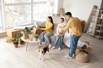 Sticker - Happy family with Beagle dog packing things in room on moving day