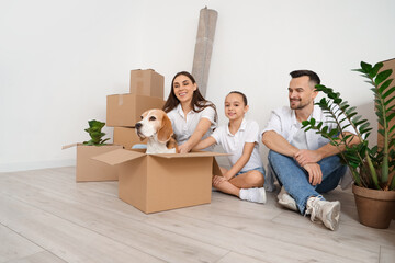 Sticker - Happy family with dog sitting near light wall in room on moving day