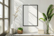 © Lucas - Interior poster mock up with square metal frame and plants in vase on white wall background. 3D rendering.