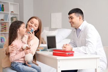 Sticker - Little girl with her mother using inhaler in clinic