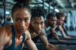 © Kuman Studio - Group of fit people working out in a gym. Multiracial friends exercising together in fitness club, Generative AI