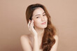 © kitthanes  - Beautiful young asian woman with clean fresh skin on beige background, Face care, Facial treatment, Cosmetology, beauty and spa, Asian women portrait.