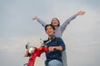 © Naypong Studio - Joyful couple on motorcycle adventure