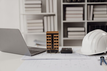 architect equipment Blueprints for buildings and houses
Architect's workplace Architecture project. Blueprint. Roll of blueprints on table. Construction background engineering tools Close-up pictures