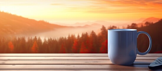 Poster - A mug is placed on a desk with copy space image