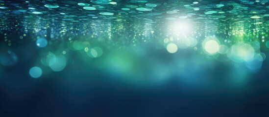 Wall Mural - the image showcases a copy space with mesmerizing bokeh lights in shades of green and blue emanating