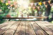 © VolumeThings - Blurred party backdrop behind an empty wooden table representing spring fun
