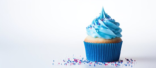 Aufkleber - A blue sprinkles cake sits on a plastic bottle with a white paper background and isolated copy space image